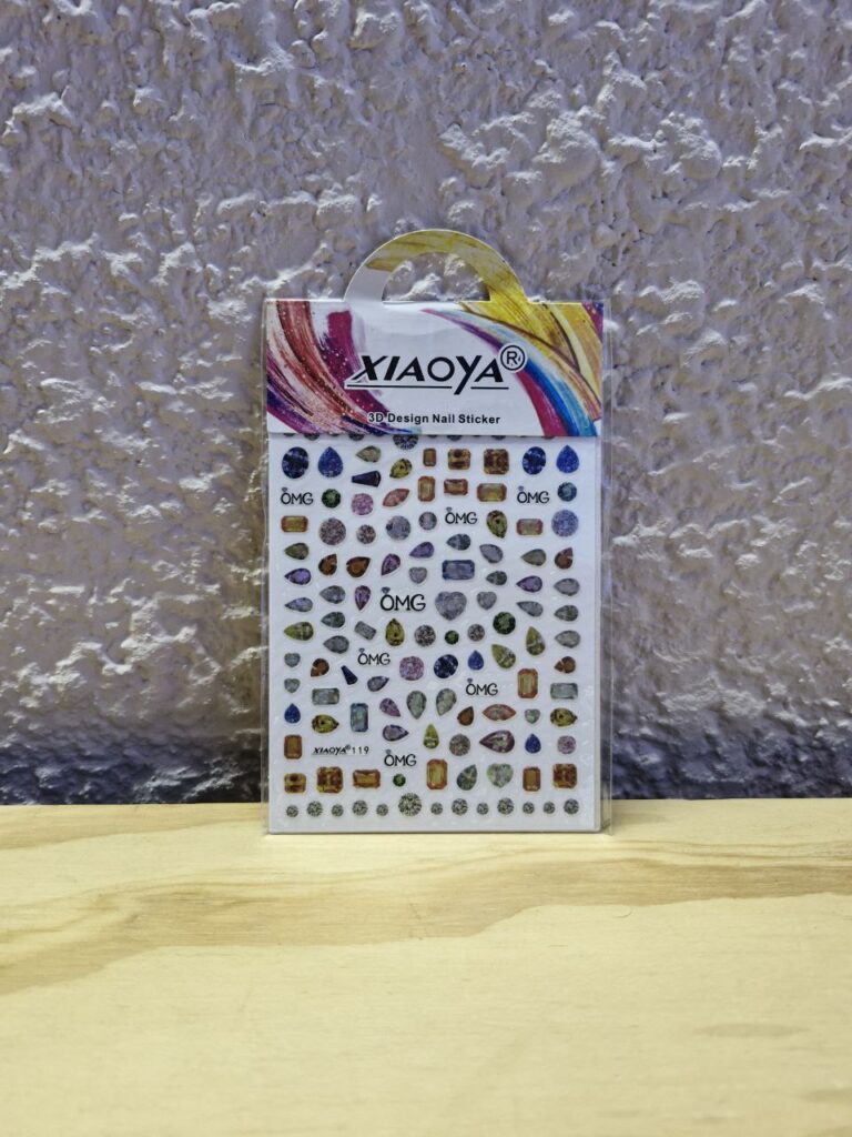 Fotografía de Adhesivos para uñas modelo Gemas y Minerales 2 Precio: $10 MXN por cada hoja Material: Plástico Formato: Plantilla con 40 estampas aproximadamente Dimensiones de paquete: Ancho 8.3 cm., Alto 13 cm. Categoría: Nuevo